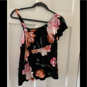 Jennifer Lopez black and floral tank.